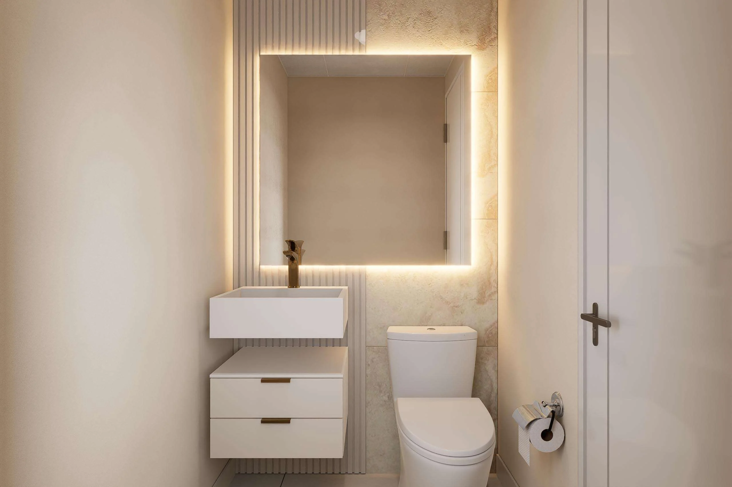 Baño con lavamanos y espejo iluminado de la Clínica Dental/Estética en Santiago — Grupo Lecaros