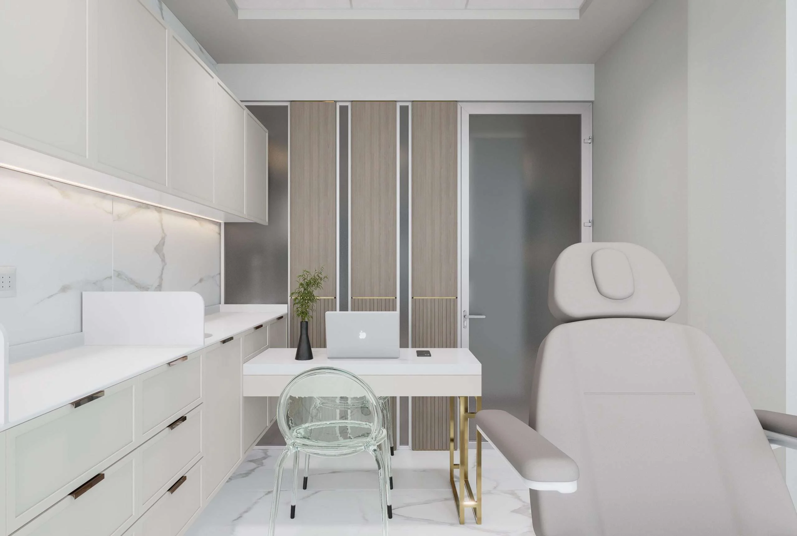 Box de tratamiento con sillón y escritorio de consulta de la Clínica Estética/Dermatológica en Santiago — Grupo Lecaros
