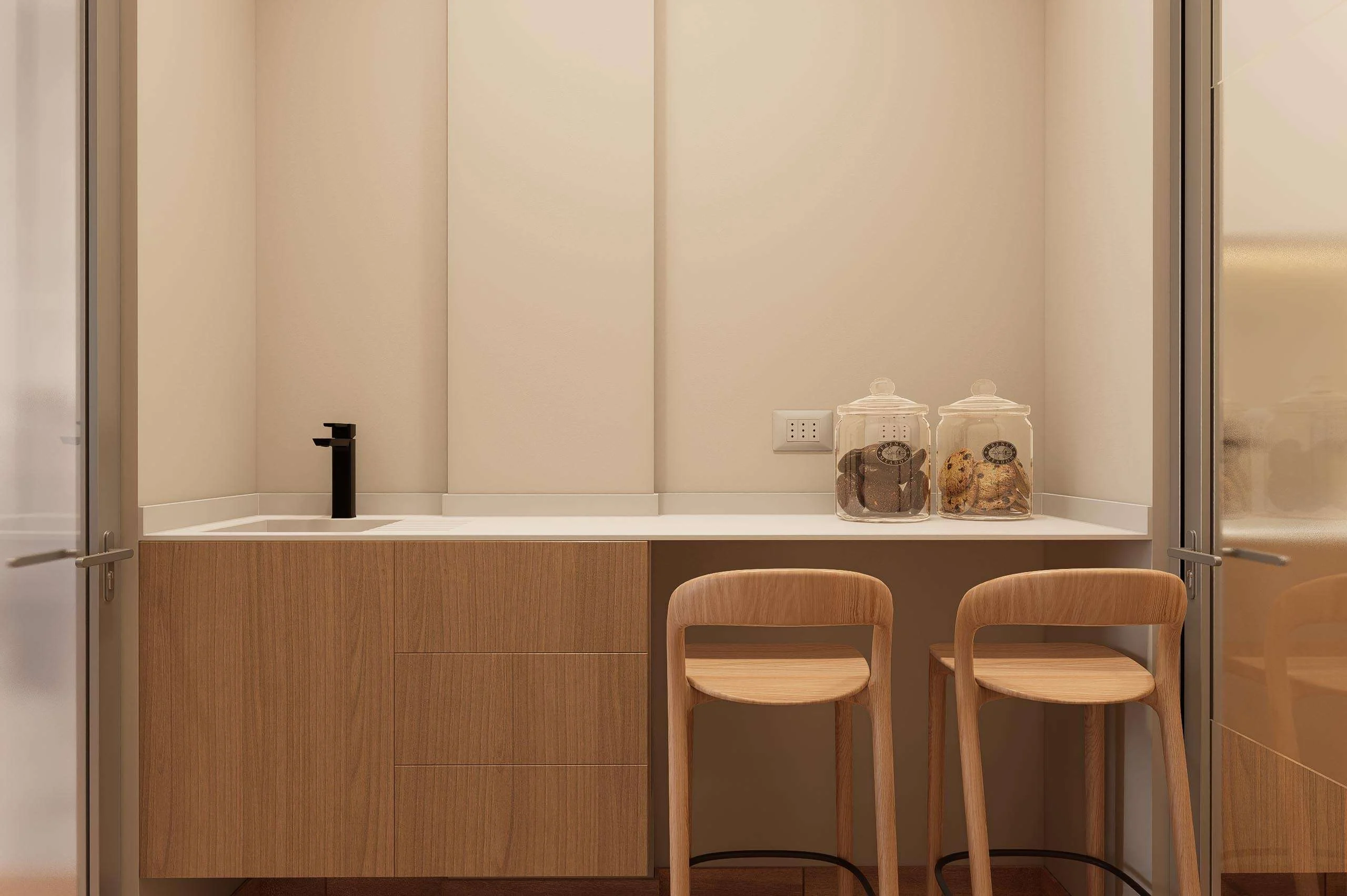 Office y kitchenette con mesón alto y taburetes de la Clínica Odontológica en Puchuncaví — Grupo Lecaros