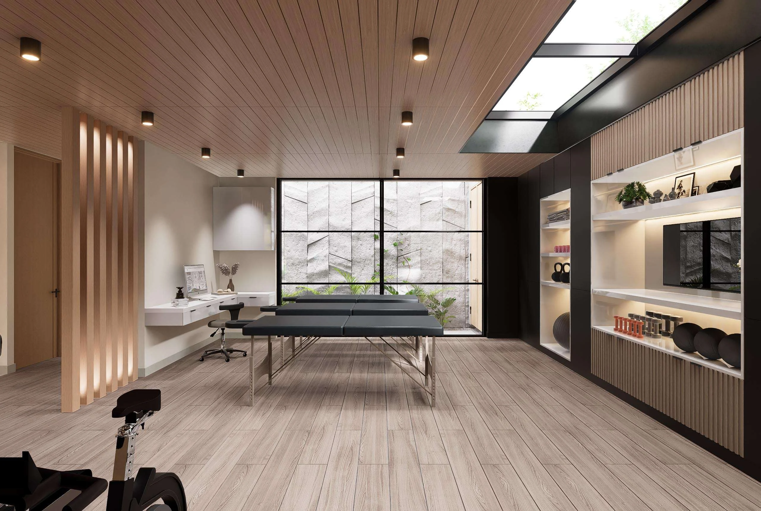 Sala de rehabilitación con camilla y equipamiento junto al patio de la Clínica de Medicina Integral en La Serena — Grupo Lecaros